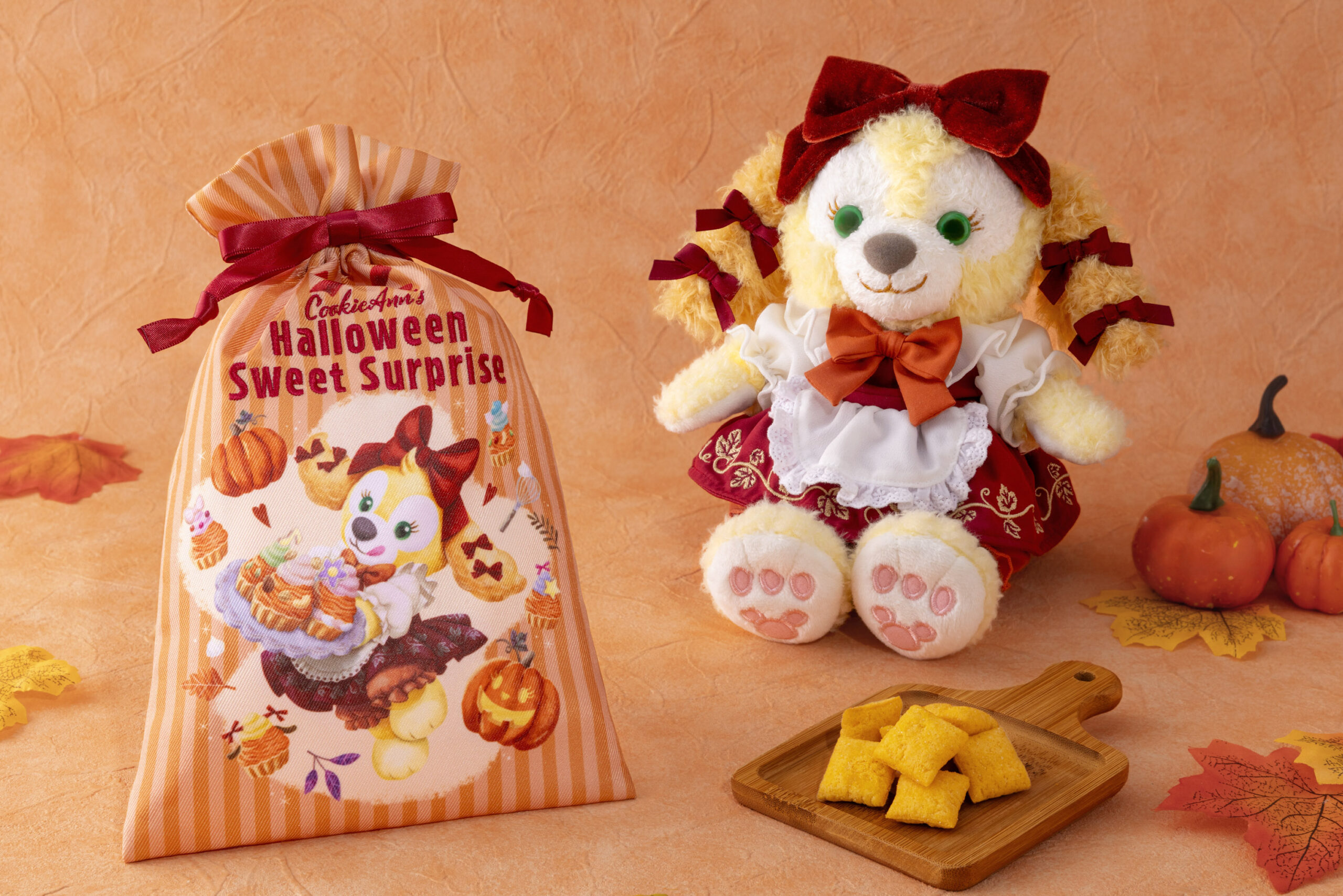 赤×白フリルドレスのクッキー・アンぬいぐるみとHalloween Sweet Surpriseのギフトバッグ、かぼちゃ風クッキー